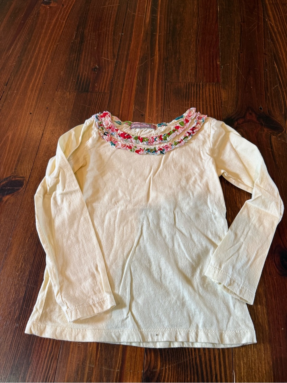 Jelly The Pug Cream Long-Sleeve Top with Floral Ruffle Neckline